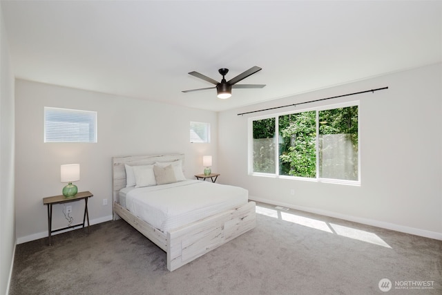 9422 Fairhaven Cir NE, Bremerton, WA 98311 - carpeted bedroom featuring baseboards and a ceiling fan