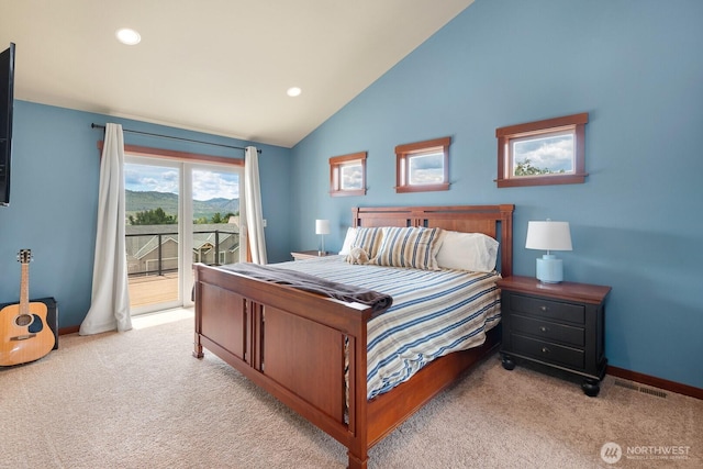 205 Butte Rd, Chelan, WA 98816 - bedroom featuring access to exterior, light colored carpet, vaulted ceiling, baseboards, and recessed lighting
