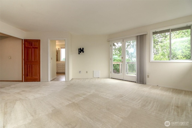5318 Galleon Dr NE, Tacoma, WA 98422 - carpeted spare room featuring plenty of natural light and baseboards