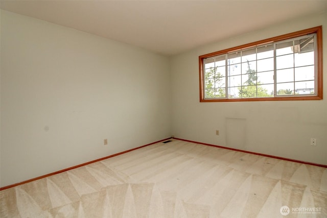 5318 Galleon Dr NE, Tacoma, WA 98422 - unfurnished room featuring light carpet and baseboards