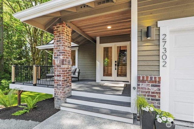 27302 NE 153rd Pl, Duvall, WA 98019 - property entrance featuring covered porch and french doors