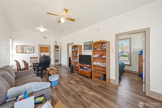 403 1st Ave S, Kent, WA 98032 - living area with wood finished floors, ceiling fan, and baseboards