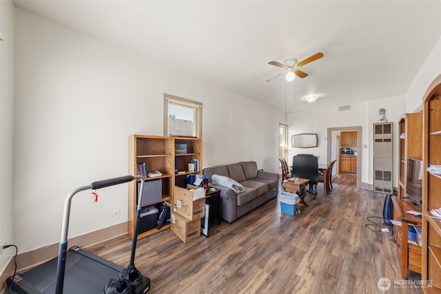 403 1st Ave S, Kent, WA 98032 - living area with a ceiling fan and dark wood-style flooring