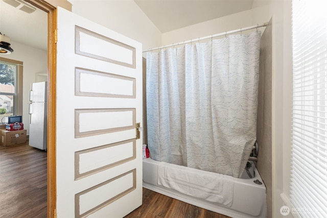 403 1st Ave S, Kent, WA 98032 - bathroom featuring shower / tub combo and wood finished floors