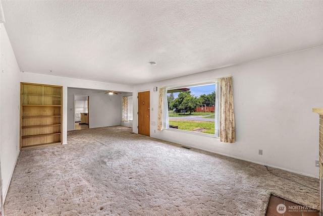420 E Connecticut St, Bellingham, WA 98225 - unfurnished bedroom featuring a textured ceiling and carpet