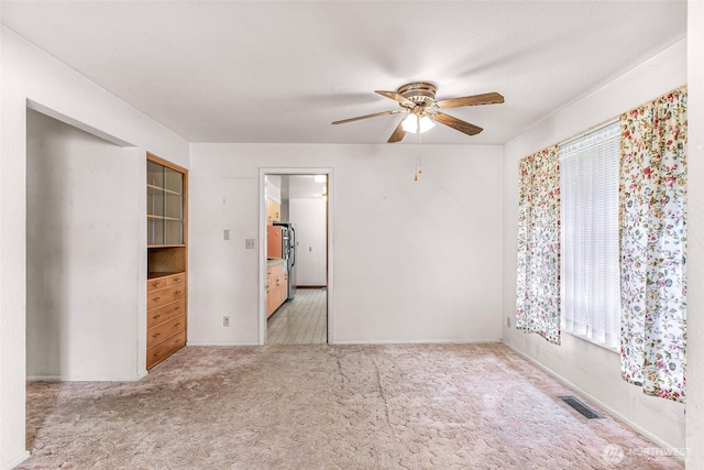 420 E Connecticut St, Bellingham, WA 98225 - carpeted spare room with a ceiling fan, plenty of natural light, and baseboards