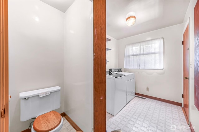 420 E Connecticut St, Bellingham, WA 98225 - laundry area with independent washer and dryer, light floors, and baseboards