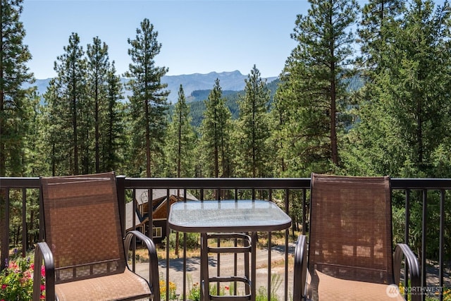 55 Wrangler Ln, Leavenworth, WA 98826 - balcony with a mountain view and a view of trees