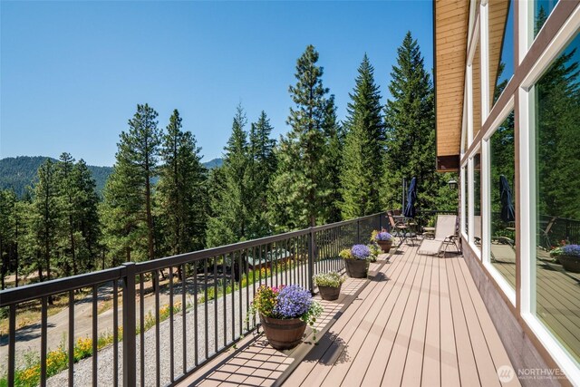 55 Wrangler Ln, Leavenworth, WA 98826 - wooden terrace with a forest view