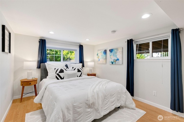1703 NE 91st St, Seattle, WA 98115 - bedroom with light wood finished floors and recessed lighting