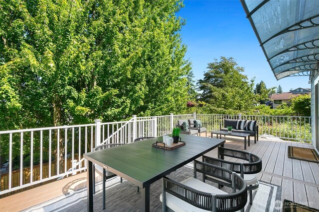 1703 NE 91st St, Seattle, WA 98115 - wooden deck with an outdoor living space