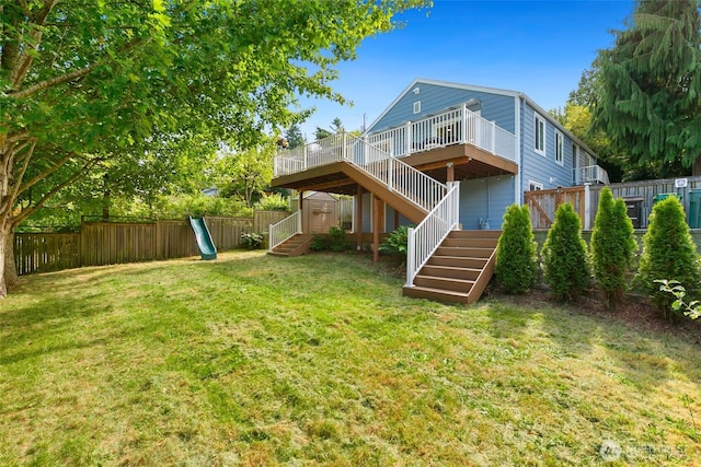1703 NE 91st St, Seattle, WA 98115 - rear view of house featuring stairway, a wooden deck, a shed, and a playground
