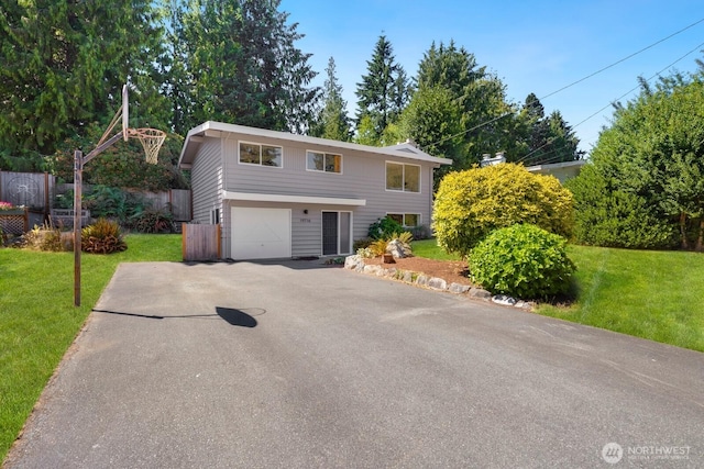 19716 81st Pl W, Edmonds, WA 98026 - view of front of home with asphalt driveway, a garage, and a front yard