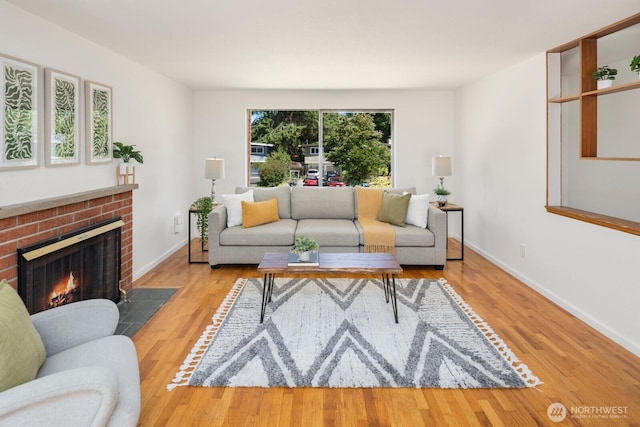 19716 81st Pl W, Edmonds, WA 98026 - living room with a brick fireplace and wood finished floors