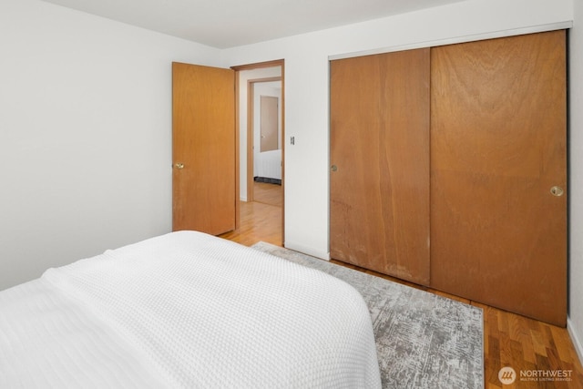 19716 81st Pl W, Edmonds, WA 98026 - bedroom featuring a closet and wood finished floors
