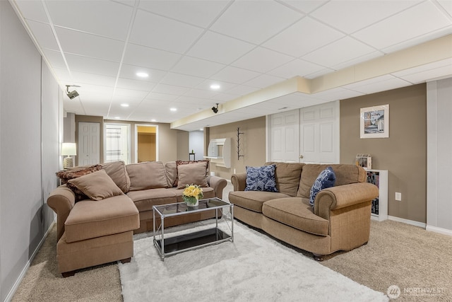 675 Bowker St SE, Lacey, WA 98503 - carpeted living room with baseboards, a paneled ceiling, and recessed lighting