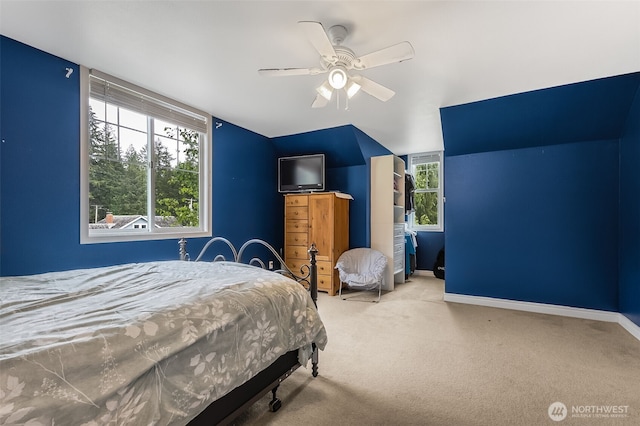 675 Bowker St SE, Lacey, WA 98503 - carpeted bedroom featuring lofted ceiling, baseboards, and ceiling fan