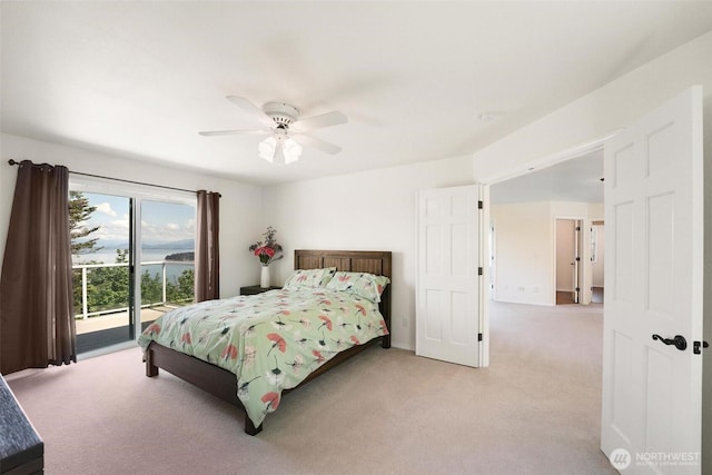 1048 Cassius Ct, Camano Island, WA 98282 - bedroom with light carpet, access to outside, and ceiling fan