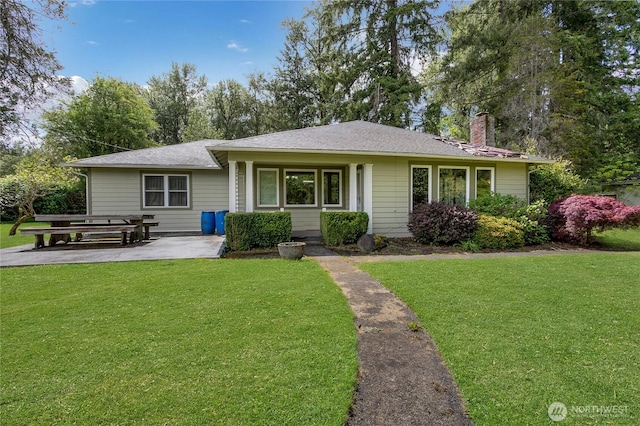 20925 SE Renton-Maple Valley Rd, Maple Valley, WA 98038 - view of front of house featuring a chimney, a front lawn, a patio area, and roof with shingles