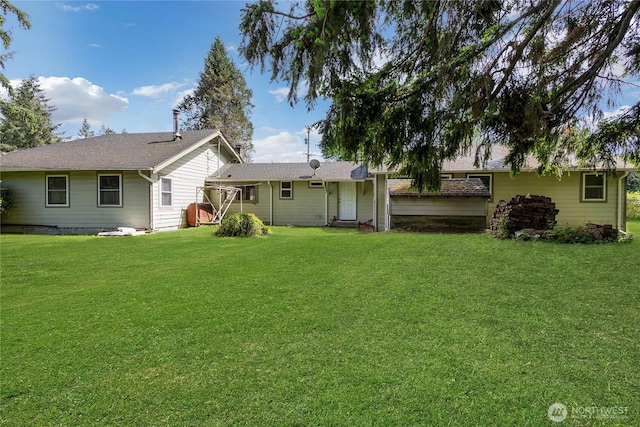 20925 SE Renton-Maple Valley Rd, Maple Valley, WA 98038 - rear view of property with a lawn