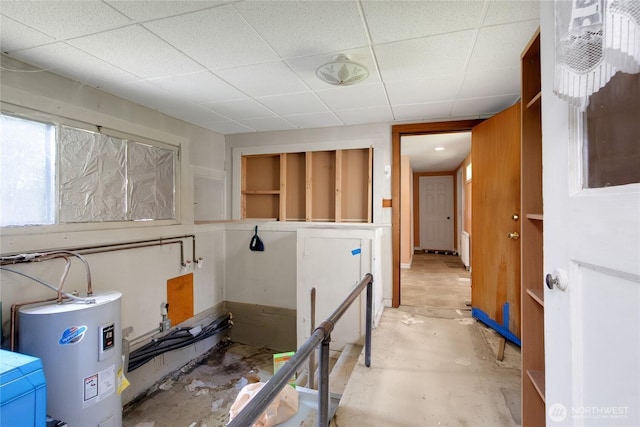 20925 SE Renton-Maple Valley Rd, Maple Valley, WA 98038 - basement featuring electric water heater, a paneled ceiling, and washer / clothes dryer
