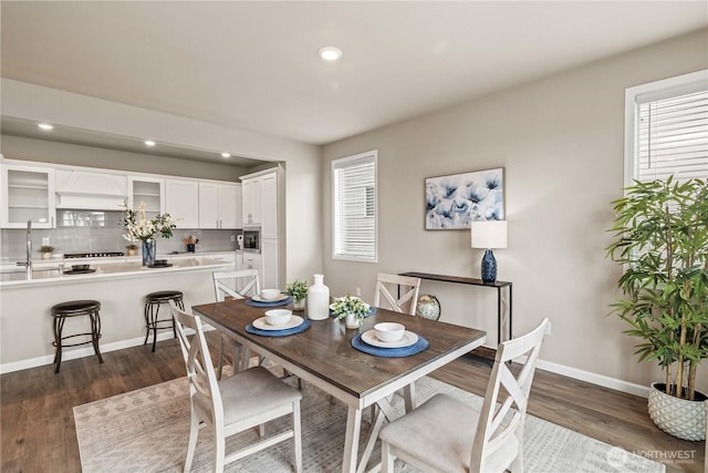25701 204th Pl SE, Covington, WA 98042 - dining area with dark wood finished floors, healthy amount of natural light, recessed lighting, and baseboards