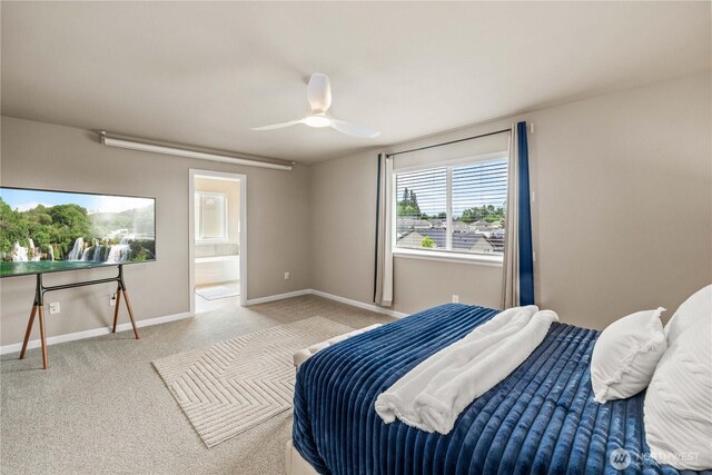 25701 204th Pl SE, Covington, WA 98042 - bedroom featuring carpet flooring, baseboards, ceiling fan, and ensuite bathroom