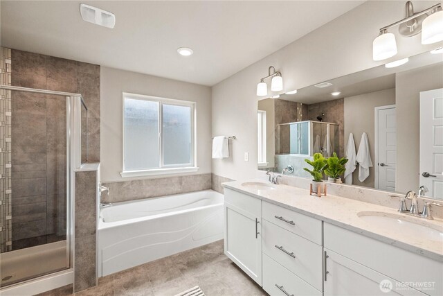25701 204th Pl SE, Covington, WA 98042 - full bathroom featuring a bath, a stall shower, double vanity, tile patterned flooring, and recessed lighting