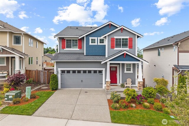 25701 204th Pl SE, Covington, WA 98042 - craftsman inspired home featuring a garage, concrete driveway, and a shingled roof