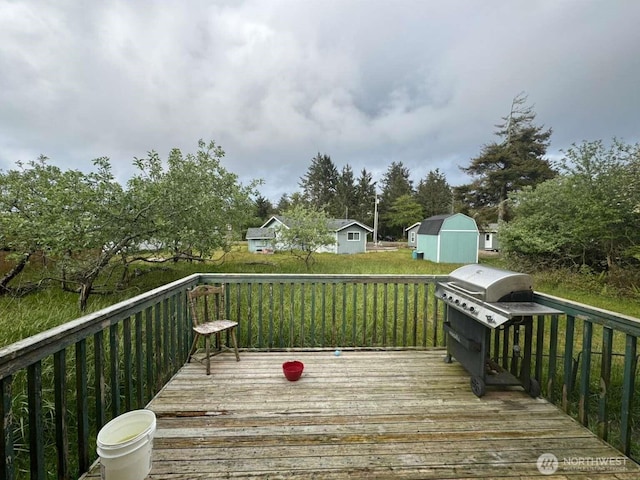 368 Snahapish Ave SE, Ocean Shores, WA 98569 - deck with a yard and area for grilling