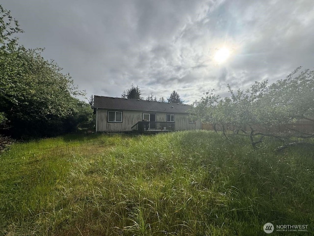 368 Snahapish Ave SE, Ocean Shores, WA 98569 - back of house with a wooden deck