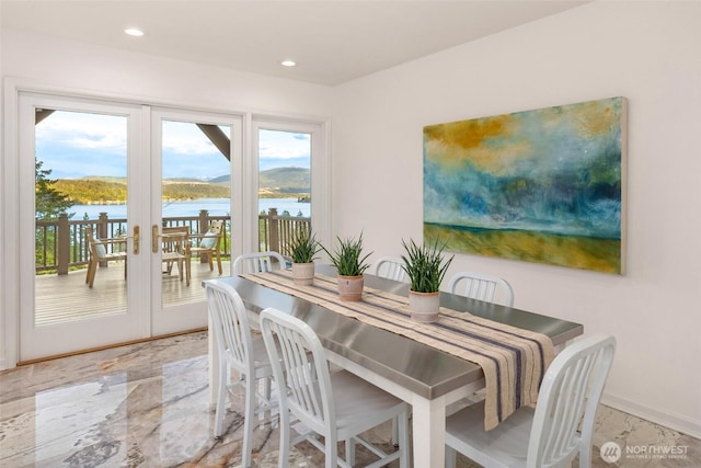 16822 SE 26th St, Bellevue, WA 98008 - dining area featuring a water view, french doors, recessed lighting, and baseboards