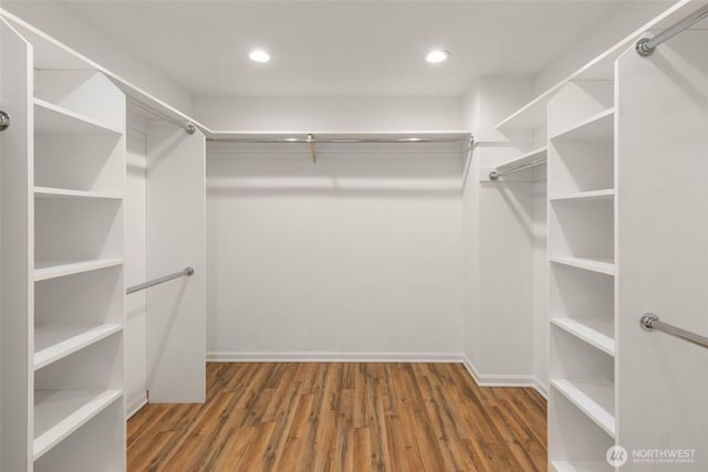 16822 SE 26th St, Bellevue, WA 98008 - walk in closet featuring wood finished floors