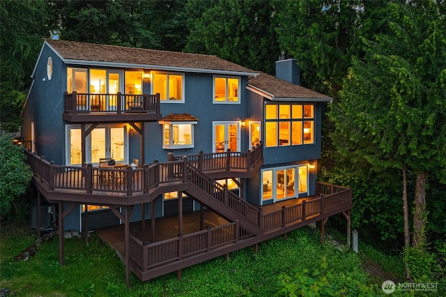 16822 SE 26th St, Bellevue, WA 98008 - rear view of property featuring a balcony, a wooden deck, a chimney, and central AC unit