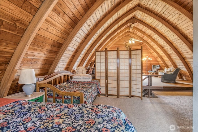 568 Cowlitz Ct SW, Ocean Shores, WA 98569 - carpeted bedroom with wood ceiling, lofted ceiling, and wood walls