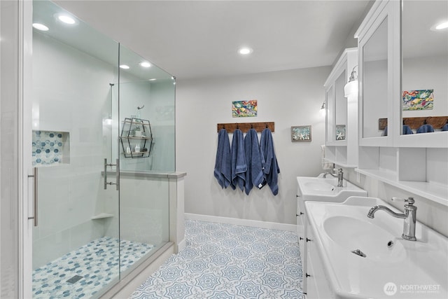 1317 60th St SE Unit A, Auburn, WA 98092 - bathroom with baseboards, a shower stall, double vanity, and recessed lighting