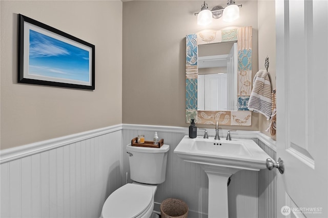 1317 60th St SE Unit A, Auburn, WA 98092 - bathroom featuring wainscoting and toilet