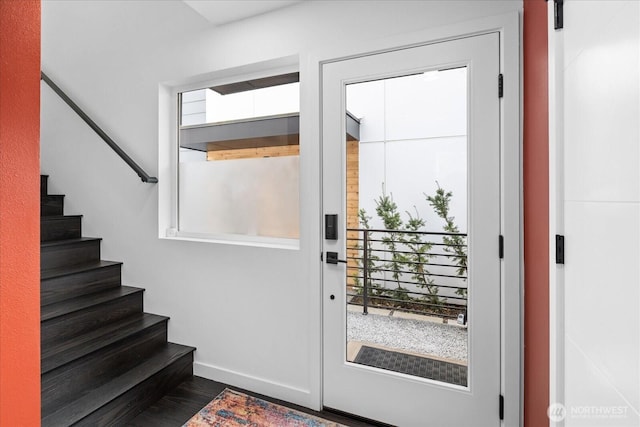 6055 7th Ave NW, Seattle, WA 98107 - doorway with stairway, baseboards, and wood finished floors