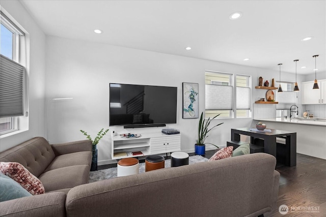 6055 7th Ave NW, Seattle, WA 98107 - living room featuring dark wood-style floors and recessed lighting