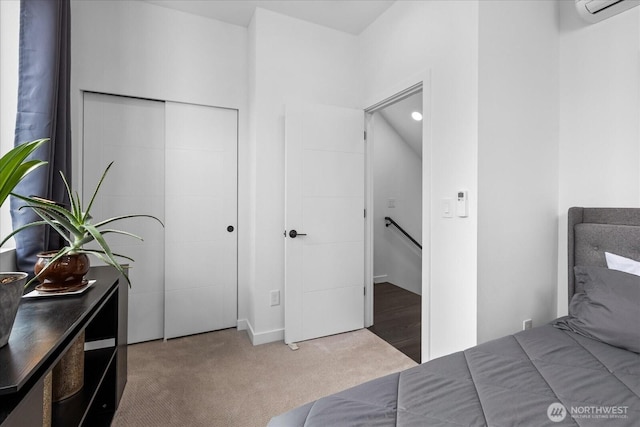 6055 7th Ave NW, Seattle, WA 98107 - bedroom with carpet, a closet, and a wall mounted AC