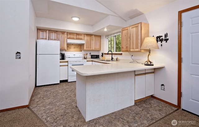 201 E Sleaford Rd, Shelton, WA 98584 - kitchen with white appliances, under cabinet range hood, a sink, baseboards, and a peninsula
