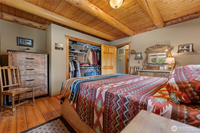 21 Oakes Dr, Tonasket, WA 98855 - bedroom with a wooden ceiling with exposed beams and wood-type flooring