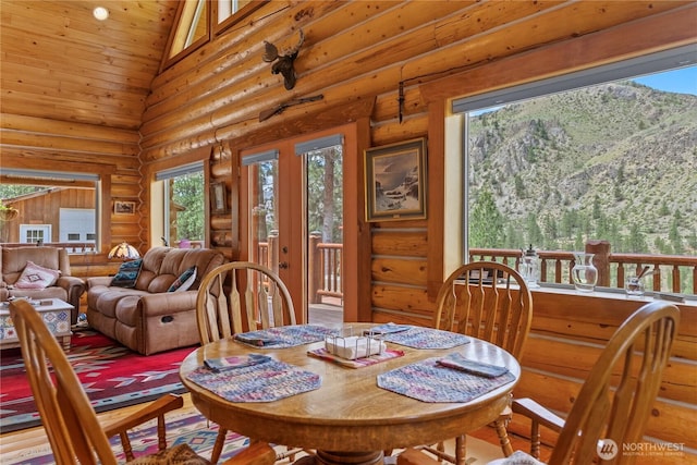 21 Oakes Dr, Tonasket, WA 98855 - dining room featuring rustic walls, high vaulted ceiling, french doors, and wood ceiling