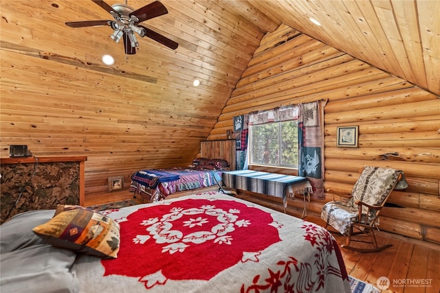 21 Oakes Dr, Tonasket, WA 98855 - bedroom with wooden ceiling, lofted ceiling, hardwood / wood-style floors, log walls, and a ceiling fan