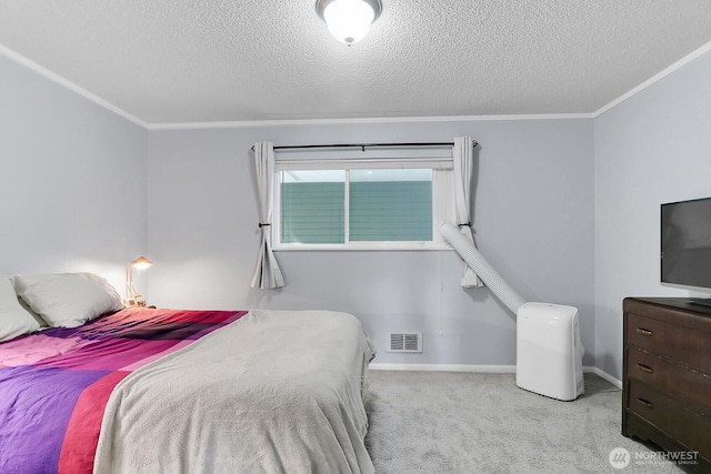 7924 SW 212th St Unit 211, Edmonds, WA 98026 - bedroom featuring crown molding, a textured ceiling, carpet, and baseboards