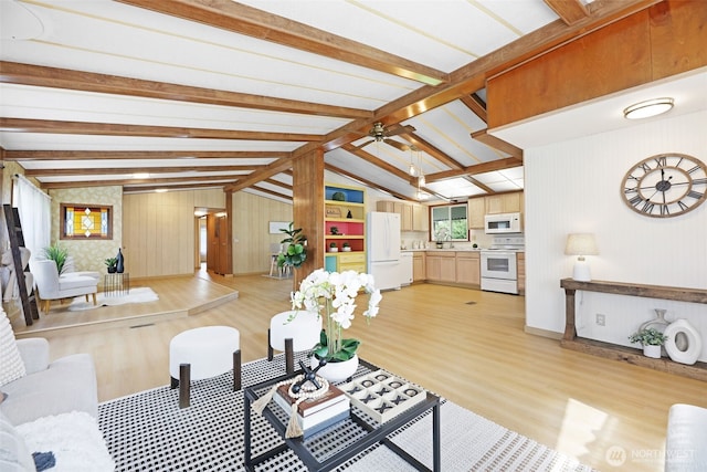 1405 226th St NW, Silvana, WA 98287 - living area featuring light wood-style floors, wooden walls, and ceiling fan