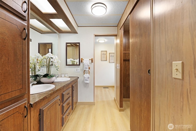 1405 226th St NW, Silvana, WA 98287 - bathroom with wood finished floors and double vanity