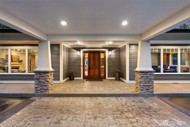 4825 Bayshore Ln NW, Olympia, WA 98502 - doorway to property featuring covered porch