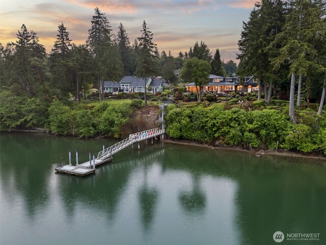4825 Bayshore Ln NW, Olympia, WA 98502 - dock with a water view and view of scattered trees