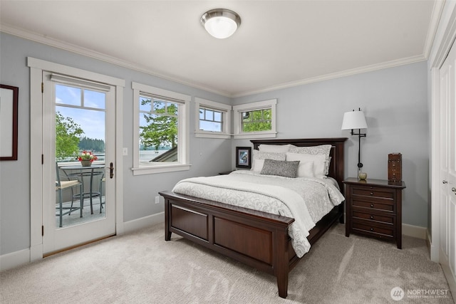 4825 Bayshore Ln NW, Olympia, WA 98502 - bedroom with access to outside, crown molding, light colored carpet, and baseboards